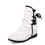 Stylish round-toe panels with solid color ties inside the heightened ladies booties